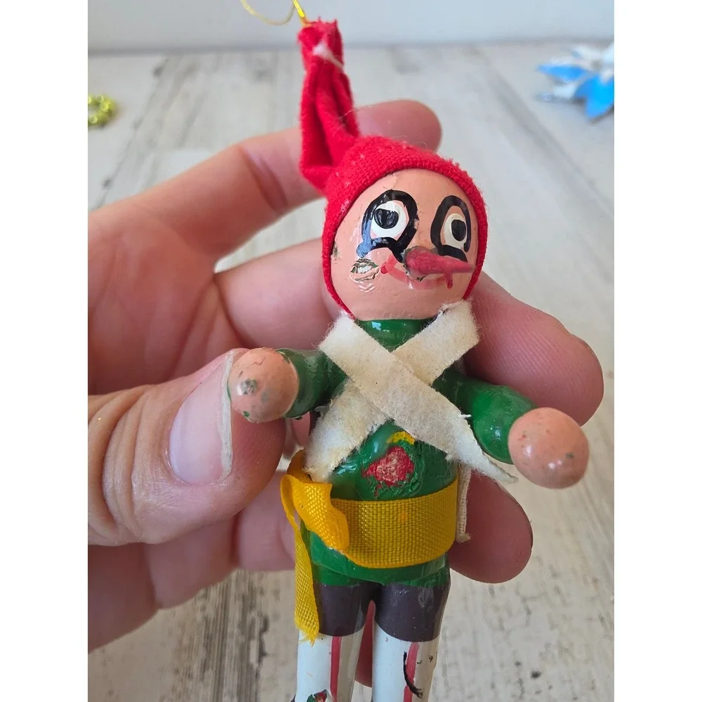 Vintage wooden Pinocchio ornament Xmas tree green red
